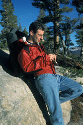 Scott taking a break on the track into Cathedral Peak