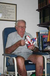 Grandad opening a present