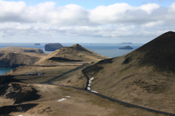 Looking south west from Eldfell, Surtsey is the island at the far rear right