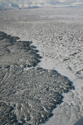 The snow makes it really easy to see the edges of lava flows