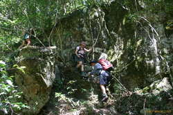 Downclimbing around a waterfall