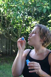 Cacey can't blow bubbles :)