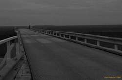 Tanja taking pictures at the far end of the bridge