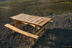 Beautifully constructed (and very recently) table on the side of the new construction road