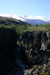 Mum about to cross the bridge over the Ljósá