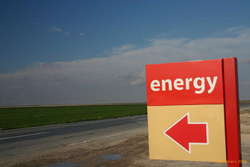 The arrow is pointing _out_ of the petrol station