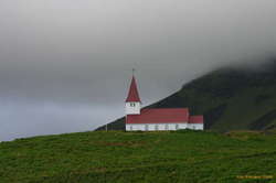 Late light on the church at Vík