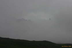 Hraundrangi sticking out of the clouds