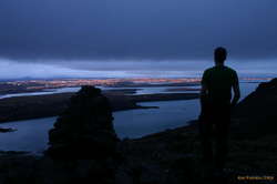 A man, some rocks, and the end of a day