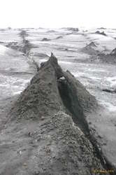 Ice, tephra and the sun make for some alien formations