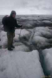 Nerida and one of the many creeks running along the glacier top