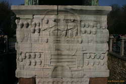 Non-Egyptian carvings around the base