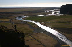 Joel watches Skógarfoss run out to sea