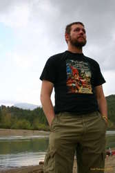 Jared poses by the beach