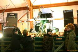 Well on their way to being mosh pit masters.  Already lining the front of the stage