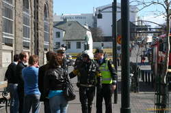 The police start to move people out of the area