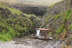 Who left that shipping container by the waterfall?