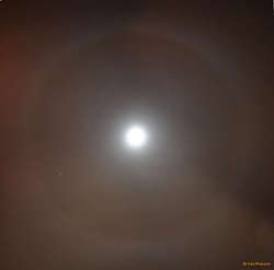 Mars inside a halo around the moon