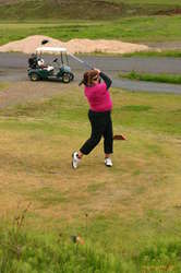 Helga tees off
