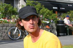 Lee is careful to shade his eyes