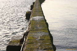 A sea wall hard at work (protecting the open sea)