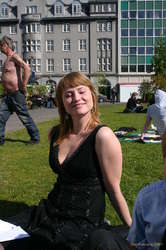 Alda happy on Austurvöllur, (with some bums).