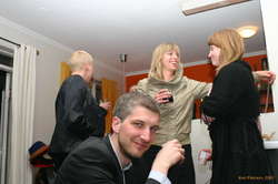 Wolfgang against a backdrop of ladies.