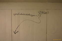 On a freshly scrubbed wall.  The word of the day is 'more graffiti'