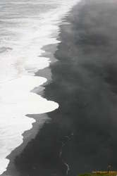 Black and white beach, in colour