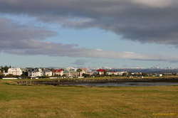 Colourful houses along the shore at Ægisíða