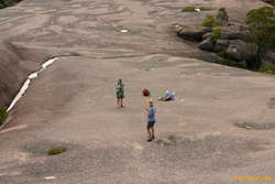 Lounging on the granite, Helen, Mum and Matthew