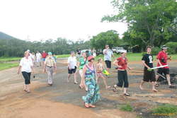 The tribe wanders off for a tour of the farm