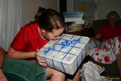 Helen admires my present, complete with royal icing