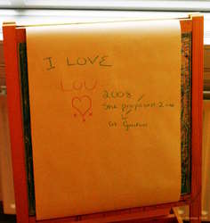 On a chair at the Photography Museum