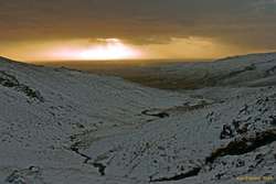 Sunny morning with clouds above