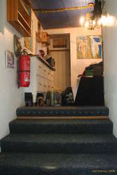 Looking up the stairs into the old place