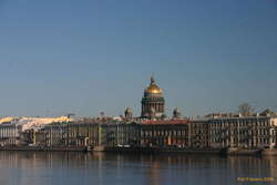 St Isaac's behind appartments along the Neva