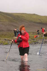 Kata steps on a pointy rock in blákvísl