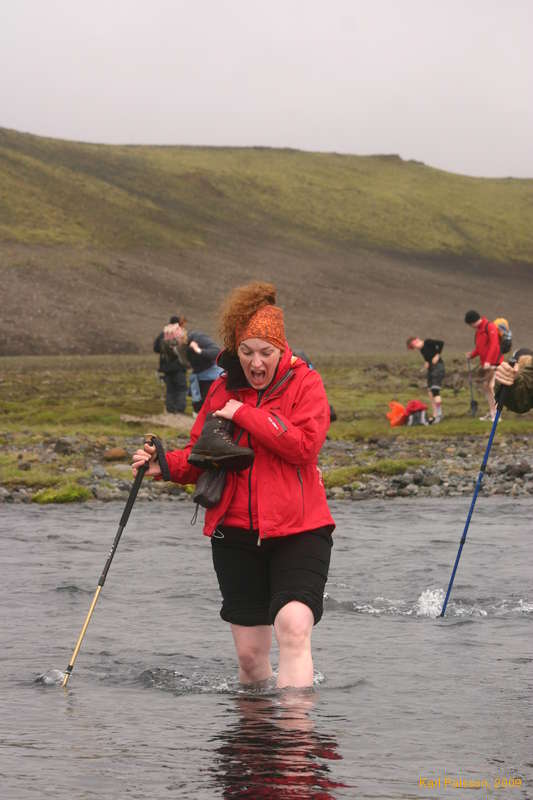Kata steps on a pointy rock in blákvísl