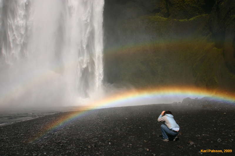 Lisa in rainbowville at Skógarfoss