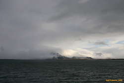 Fog sneaking up on Esja