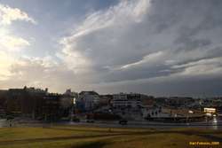 Clouds moving away to the east