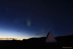Aurora in the dawn light over Arnardalur