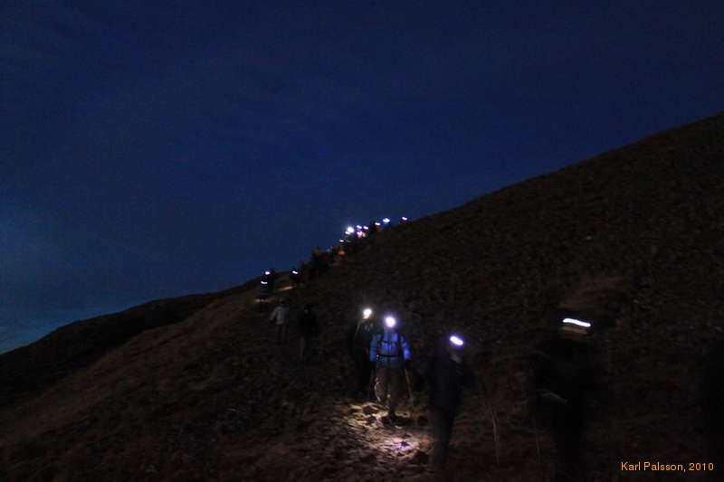 Conga line of headlights, coming down Ulfarsfell