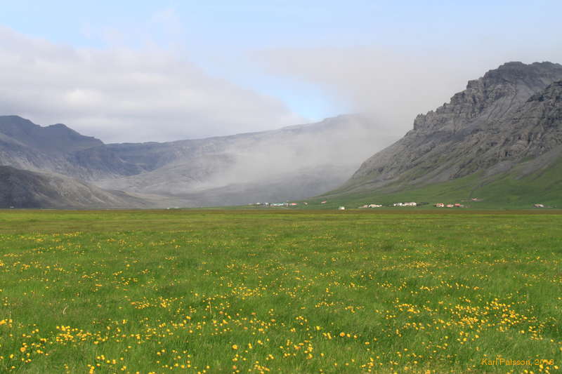 Ash clouds above green fields, south coast