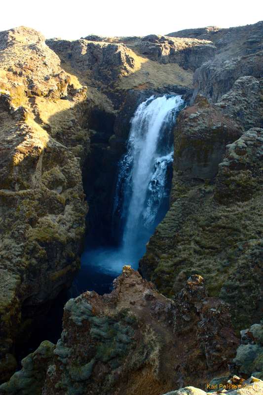 Frosty waterfall on Skógá