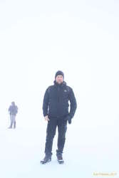 Logi on top of something, somewhere