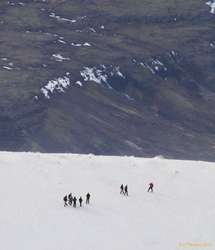 The lead group down on the ridge
