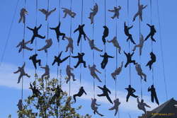 People hanging from the sky