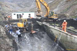 Work is fast when you have big toys